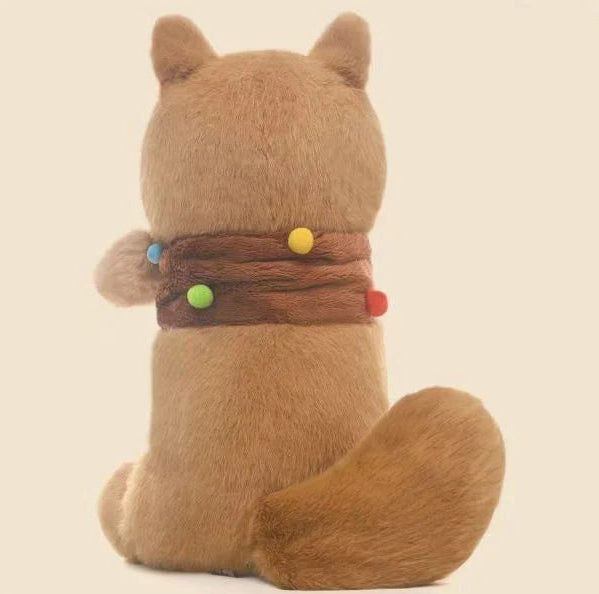 Stuffed toy dog with colorful collar on a beige background